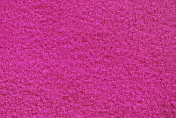 Purple soft shaggy fabric texture as background