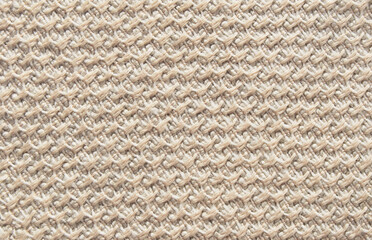 Beige boucle fabric texture as background