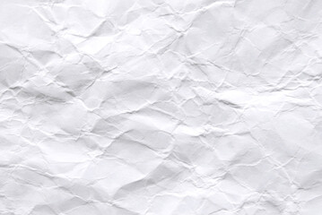 A sheet of white wrinkled paper texture as background	