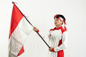 asian young man posing with his index finger, celebrating independence day 17 august, independence day concept, isolated white background