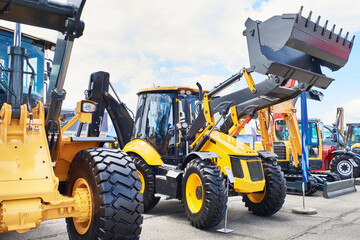 Tractor with front loader bucket agricultural machines