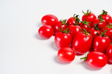 Studio shot photo of cherry tomato against white background