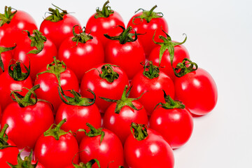 Studio shot photo of cherry tomato against white background