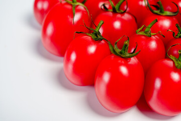 Studio shot photo of cherry tomato against white background
