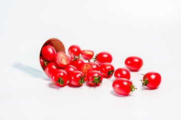 Studio shot photo of cherry tomato against white background