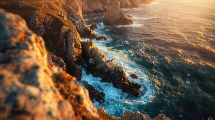 A rocky shoreline with a beautiful blue ocean in the background