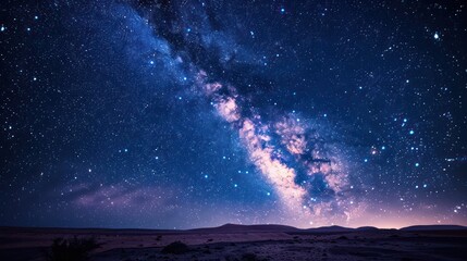 Fototapeta premium The sky is filled with stars and the Milky Way