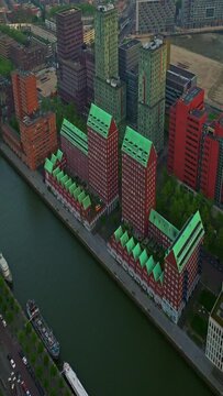 Aerial view Rotterdam city in The Netherlands. Destination in Holland. Erasmusbrug and river Maas urban city view at sunset
