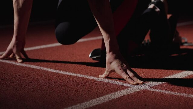 Professional Runner Waiting For Start, Athletic Man Standing In Low Start Position, Closeup Of Hands