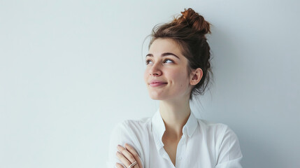 Happy businesswoman daydreaming while looking to the side