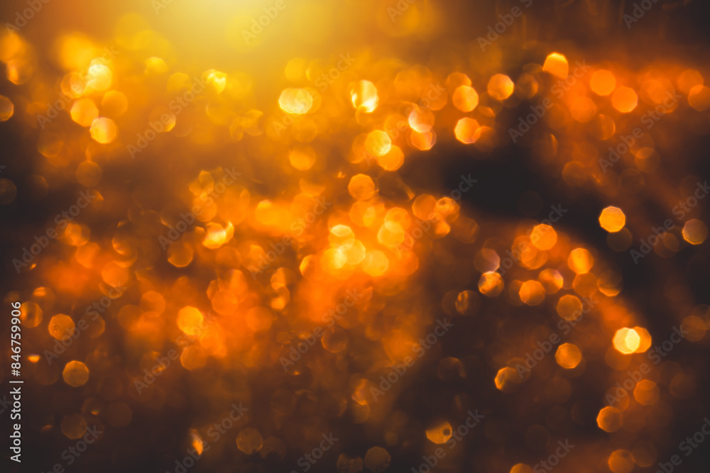 Wall mural Bokeh from blurred orange flame background