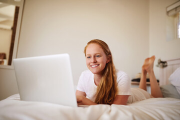 Girl, laptop and social media for networking while on bed, searching and home for browsing for movie. Laugh and smile at streaming site for entertainment, online in bedroom and post blog on website
