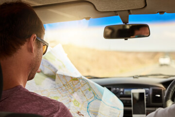 Car, reading map and travel on vacation, road trip and planning holiday for navigation. Friends, men and direction guide in transport for journey, adventure and driving back to location destination