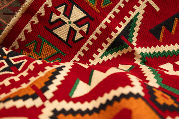 Red traditional rug, close up