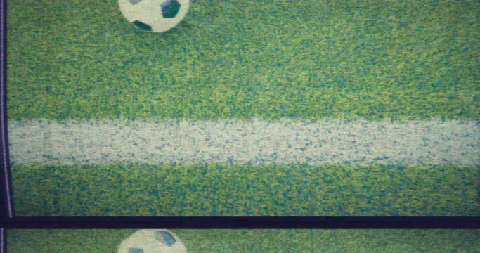 Soccer VHS - A soccer ball rolling over a line marking of a soccer field - Video played from a damaged VHS tape and/or displayed on a defective TV - VFX