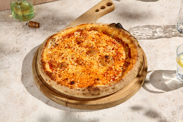 Pizza Margherita in Sunlight with Summer Shadows on Rustic Table
