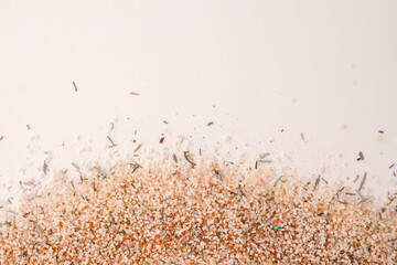 Italian salt with spices on a white background