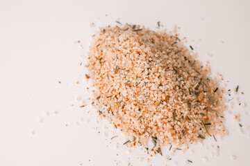 Italian salt with spices on a white background