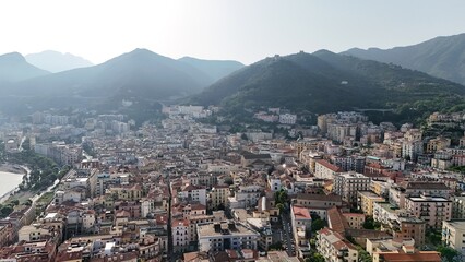 Salerno, in Campania, is famous for the stunning Amalfi Coast. It offers breathtaking views of the Tyrrhenian Sea, beautiful beaches, and a lively promenade, perfect for scenic walks