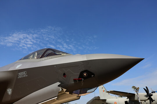 Bucharest, Romania - May 2024. An F-35 Lightning II fighting military jet airplane is park on a runway and presented to the public at a military equipment exhibition.