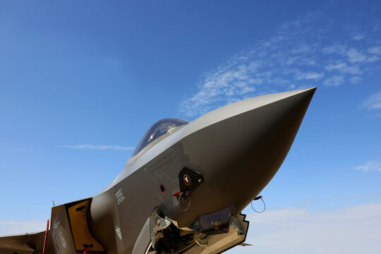 Bucharest, Romania - May 2024. An F-35 Lightning II fighting military jet airplane is park on a runway and presented to the public at a military equipment exhibition.