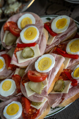 Fresh sandwiches with ham and egg.
