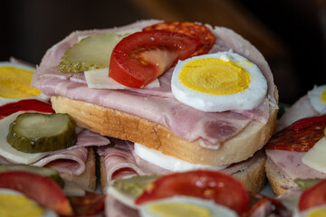 Fresh sandwiches with ham and egg.