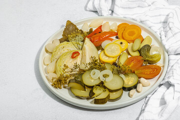 Assorted fermented vegetables. Probiotics, healthy food, vitamins. Vegan lifestyle, pickled dish