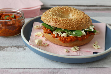 Sesame Bagel with Ajvar, Feta, and Lamb's Lettuce