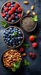 A bowl of blueberries sits next to a bowl of almonds and a bowl of raspberries