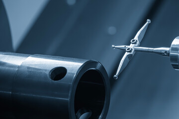The modular touch probe checking the tube parts on CNC lathe machine.