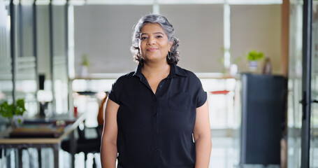 Indian Asian happy older aged adult boss ceo woman lady agent look cam do pose head shot video elder old gen x healthy female leader worker staff expert standing proud indoor job office work place day