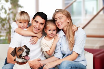 Authentic portrait happy young couple with dog