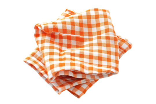 a folded orange and white checkered napkin