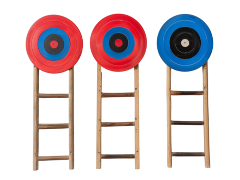a group of ladders with targets on them