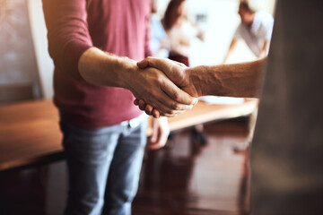 Obraz premium Shaking hands, agreement and deal in meeting or casual, negotiation for business contract or onboarding. Greeting, palms and together for hiring or welcome, collaboration or teamwork with thank you