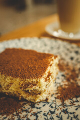 Tiramisu and coffee, breakfast in the restaurant
