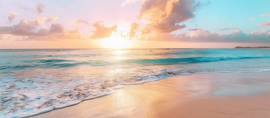 Vibrant sunrise on the beach by the ocean.