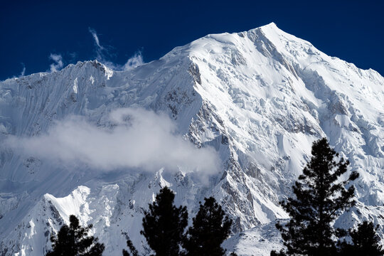 Nanga Parbat, meaning "naked mountain" in Urdu and locally called Diamer, or "King of the Mountains," Located just southeast of the northernmost bend of the Indus River in Pakistan's Gilgit-Baltistan 