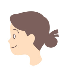 髪をお団子にまとめた女性の横顔
