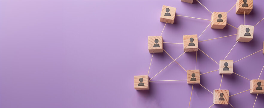 A visual metaphor for networking and team dynamics, featuring wooden blocks with human icons interconnected by lines on a purple backdrop.