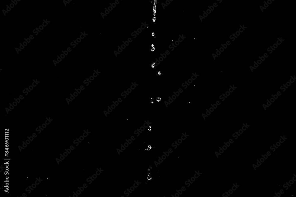 Poster A black and white photo of water pouring from a faucet. Suitable for various design projects.