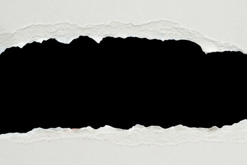 White ripped paper torn edges strips isolated on black background