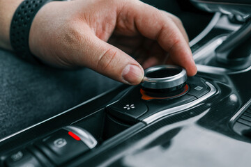 Car multimedia system control joystick. Radio, multimedia, and navigation adjustment buttons