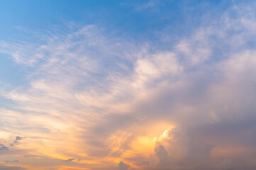sunset or sun rise sky with rays of light shining clouds and sky background and texture