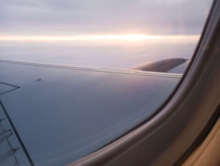Naklejka premium Nice sunset from the deck of a flying plane.