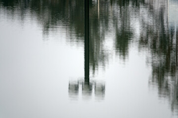The reflection of lamp on the water