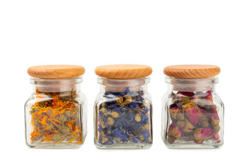 Assortment of dry herbal and berry tea isolated on a white background. Tea party concept. medicinal herbs. Healing herbs.Alternative medicine.Linden, calendula, cornflowers, marigold, tansy, tea rose.