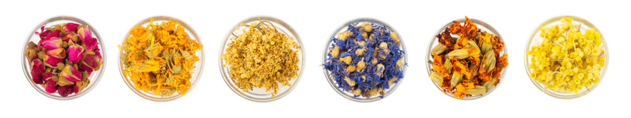 Assortment of dry herbal and berry tea isolated on a white background. Tea party concept. medicinal herbs. Healing herbs.Alternative medicine.Linden, calendula, cornflowers, marigold, tansy, tea rose.