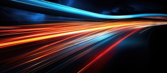 Vibrant light streaks captured in a long exposure night photo, depicting modern life and speed traffic. with copy space image. Place for adding text or design